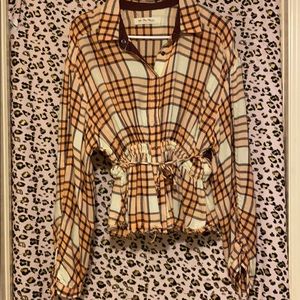 Plaid blouse with clasps and middle tie.